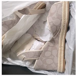 Coach shoes brand new never been worn, tie up around leg. Beautiful